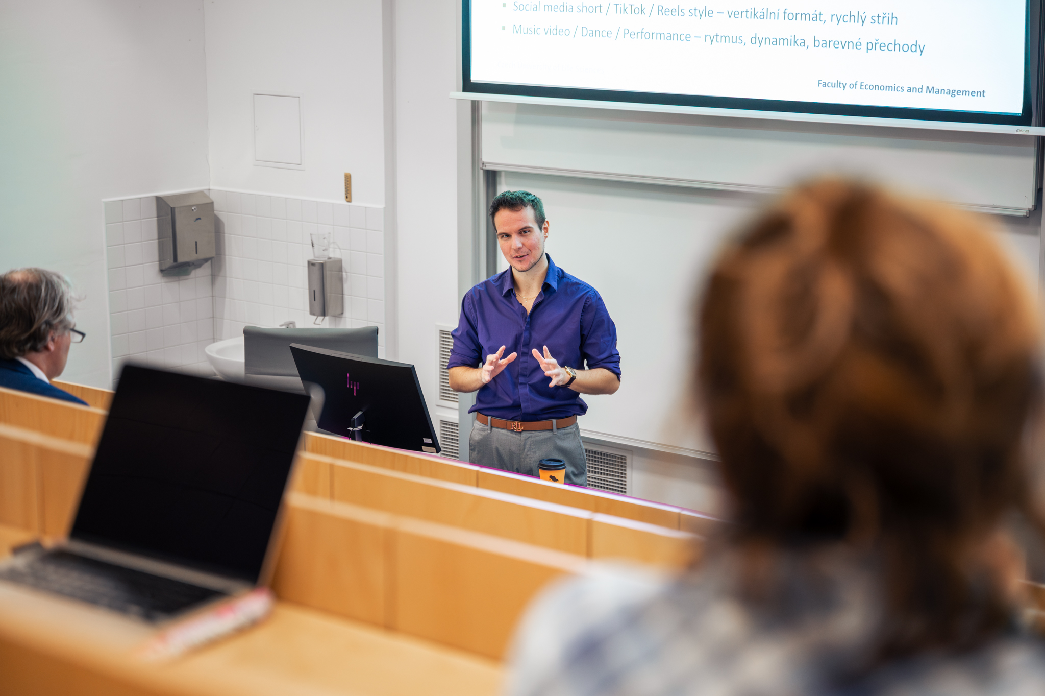 Teams evaluate generated video shots on projectors in lab DII